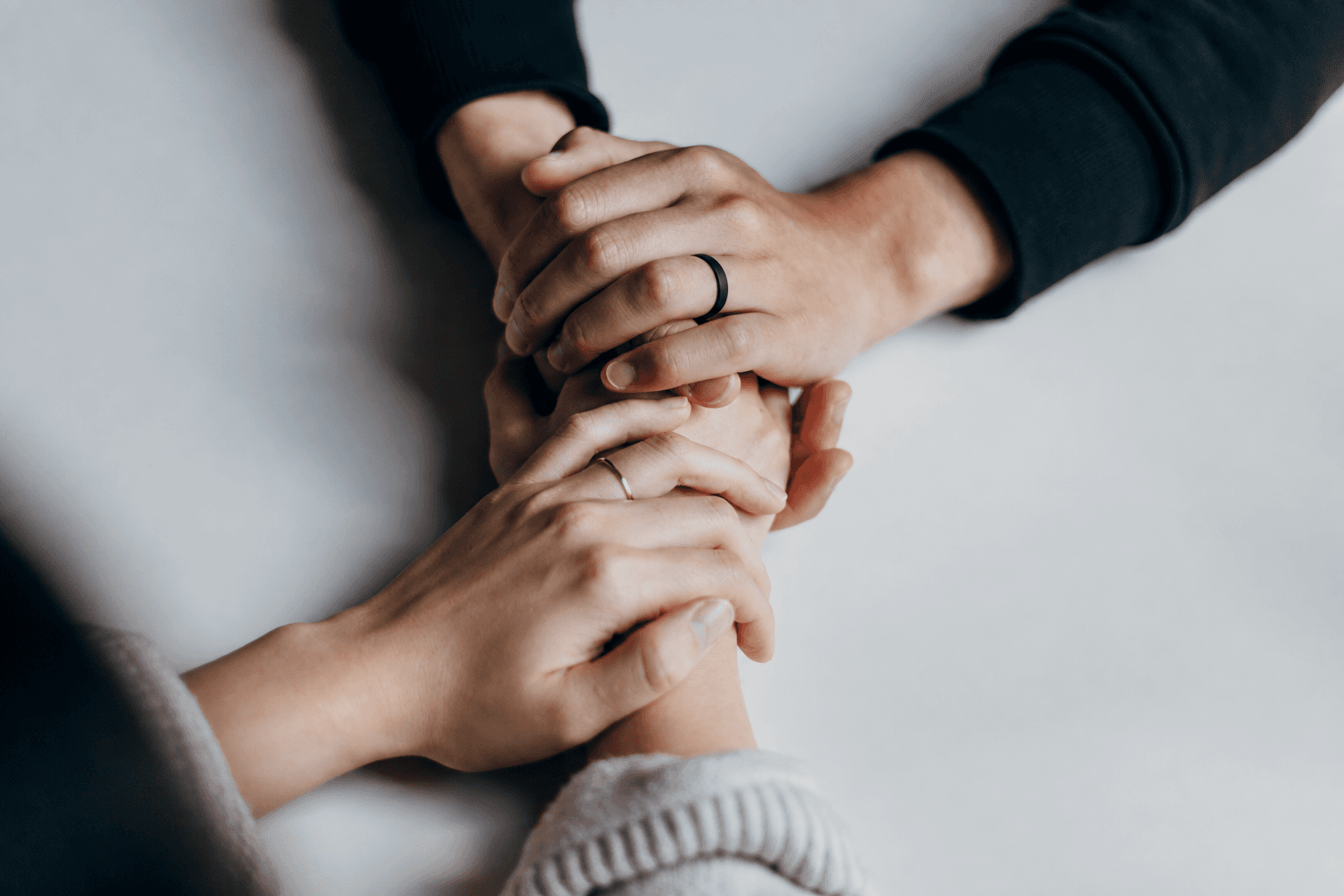 Hands joined in support